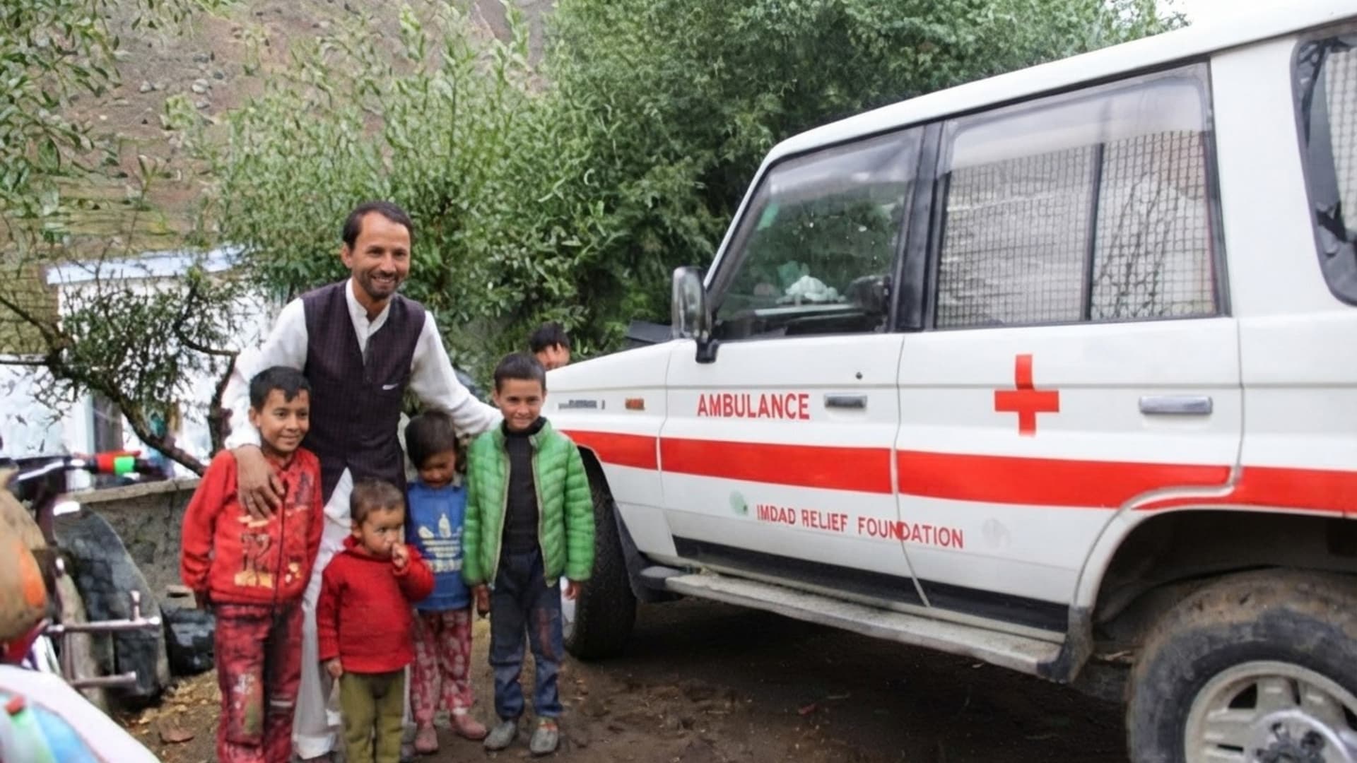 Mobile relief ambulance with local children